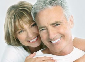 couple with perfect dentures from Denture clinic brisbane